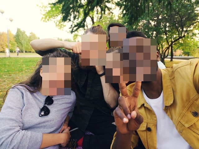 The same outdoor scene with every face covered by HideFace